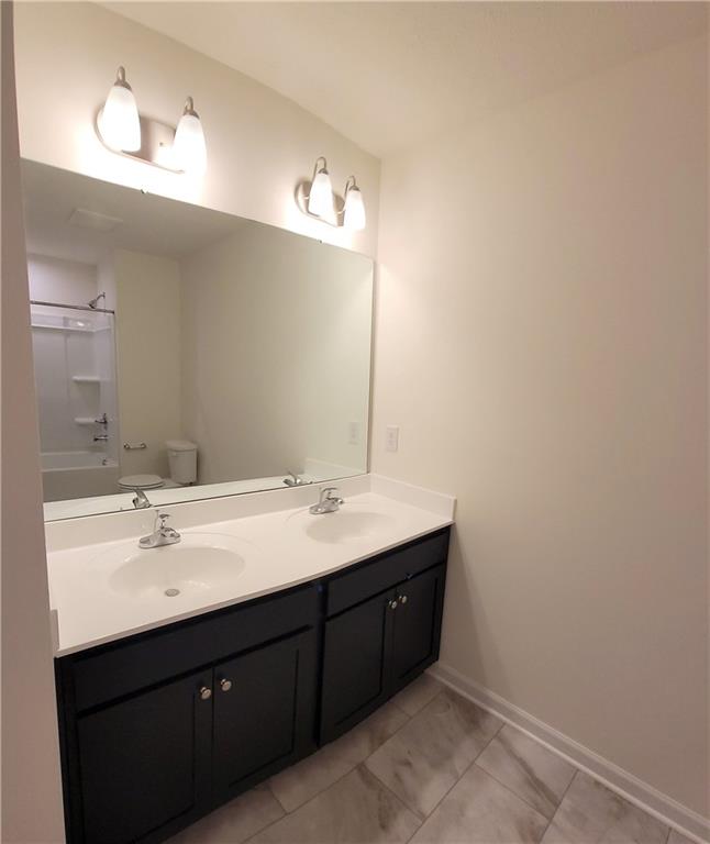 236 Wyncrest Drive Butler, PA 16001 - Photo 19 of 23 a bathroom with a sink vanity and mirror