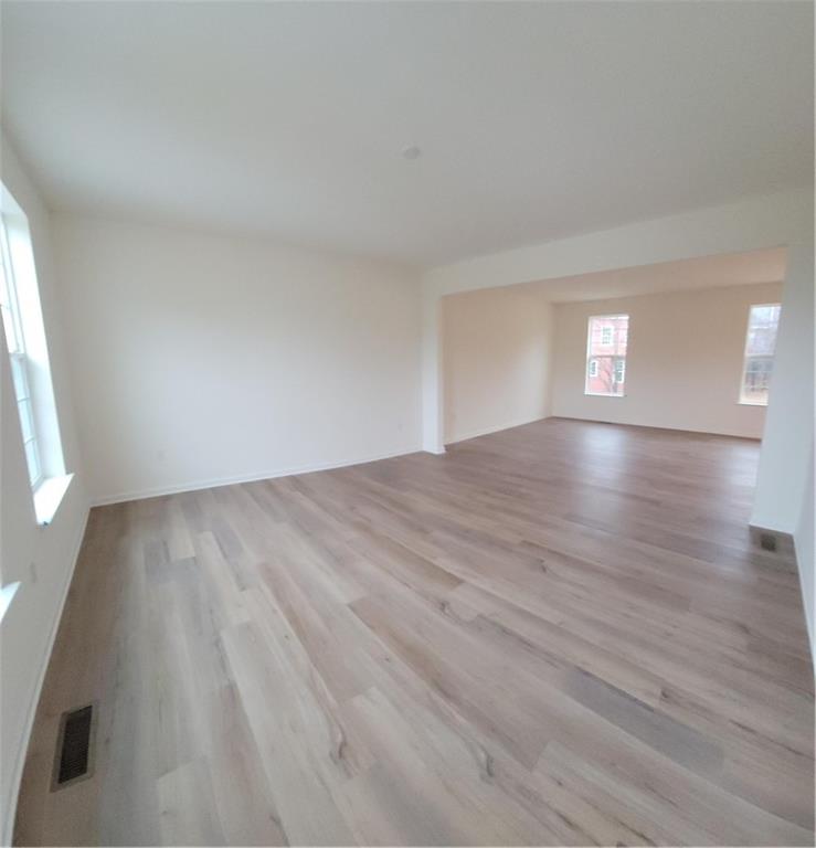 236 Wyncrest Drive Butler, PA 16001 - Photo 9 of 23 a view of empty room with wooden floor and fan