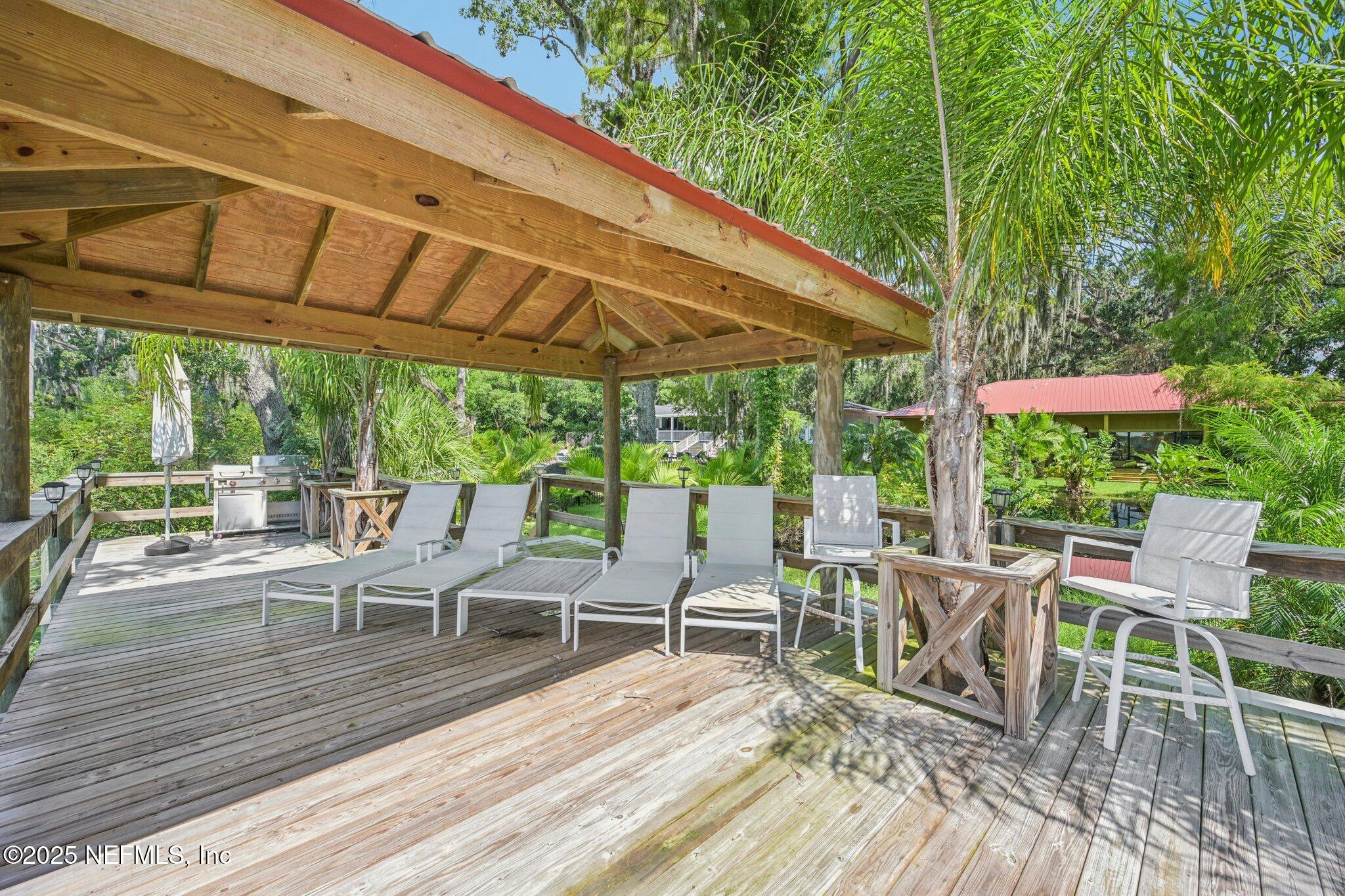2778 Holly Point Road West Orange Park, FL 32073 - Photo 12 of 68 a view of a chairs and table in patio