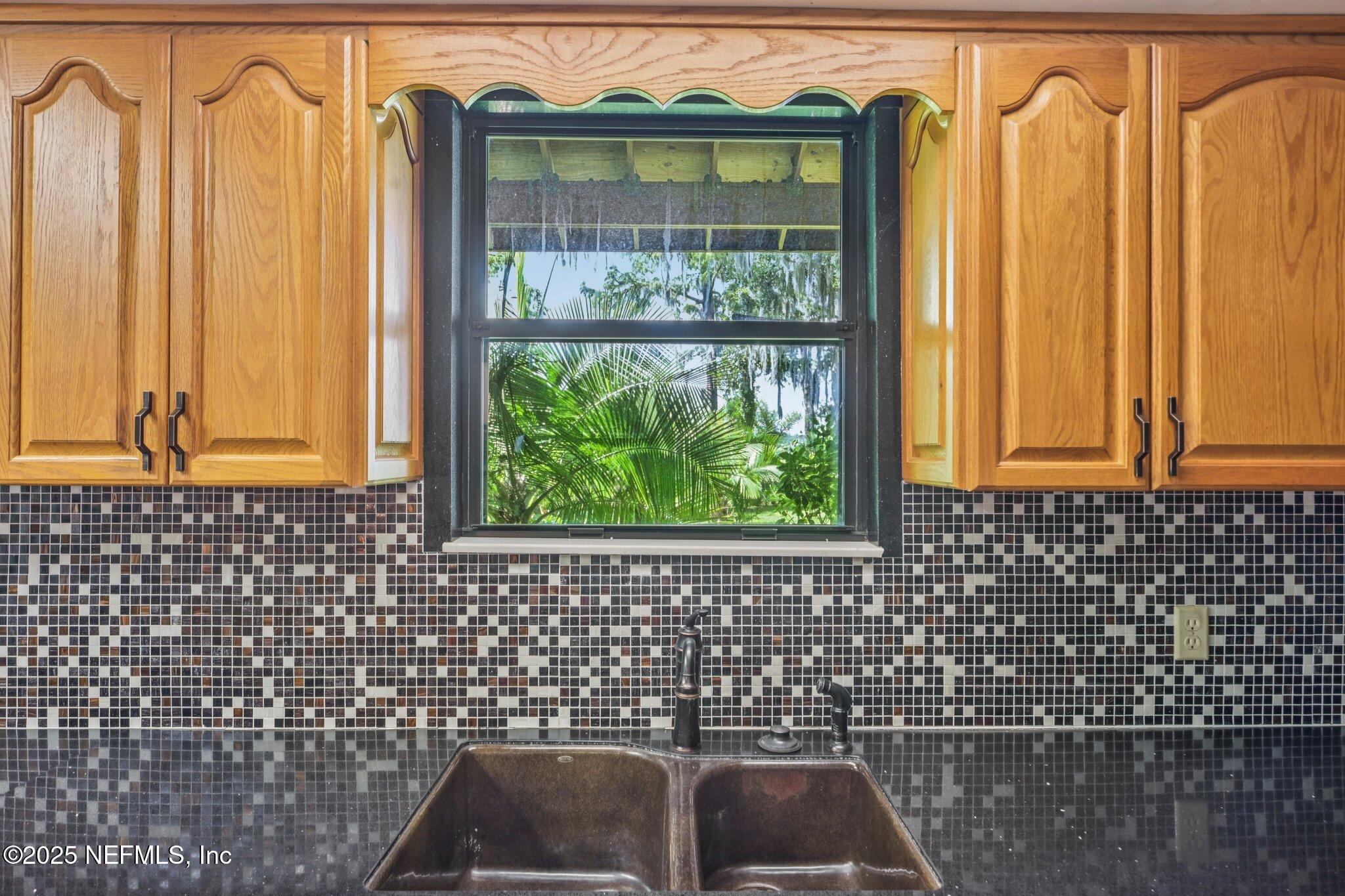 2778 Holly Point Road West Orange Park, FL 32073 - Photo 38 of 68 a front view of a house with a window