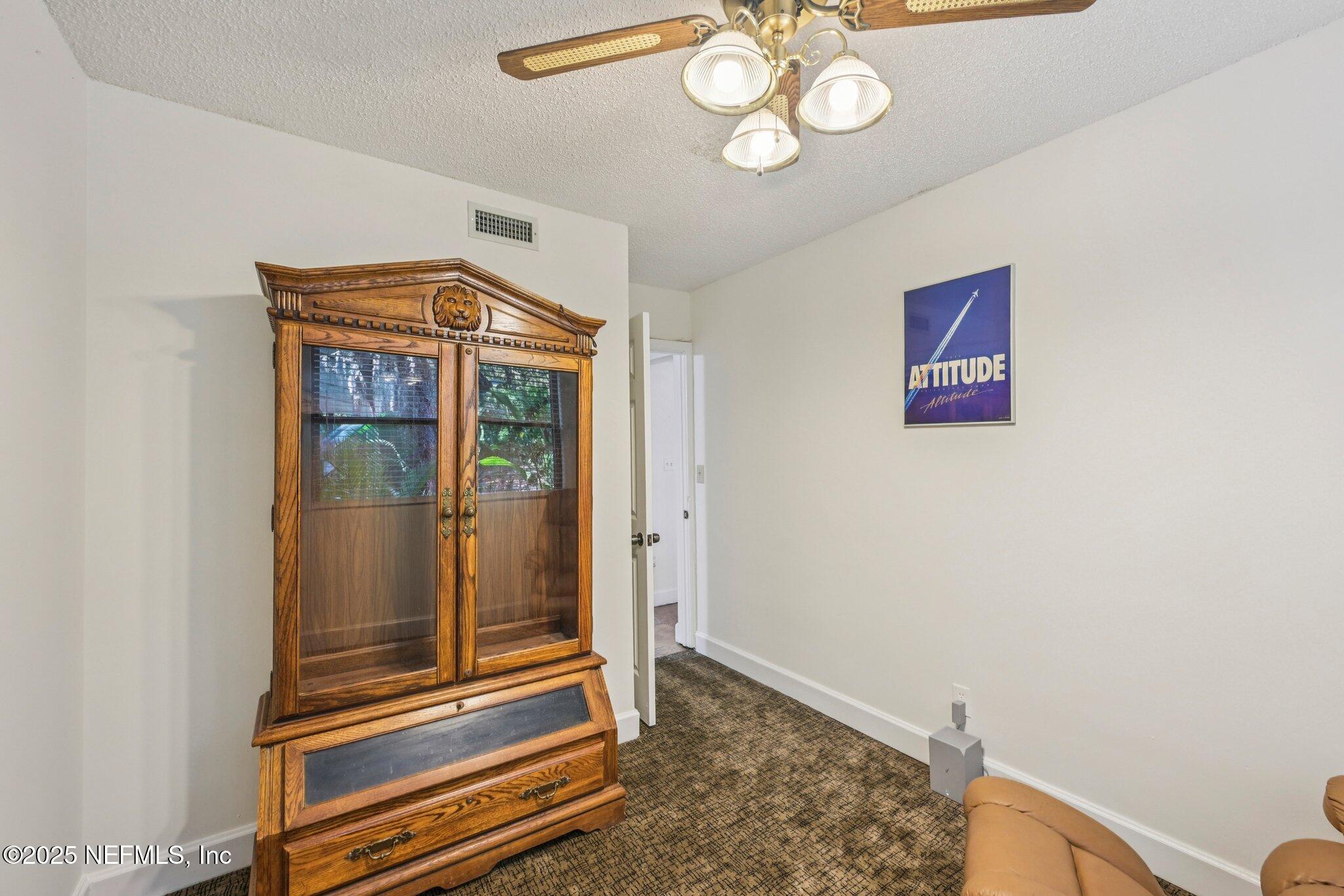 2778 Holly Point Road West Orange Park, FL 32073 - Photo 40 of 68 a view of room with wooden floor
