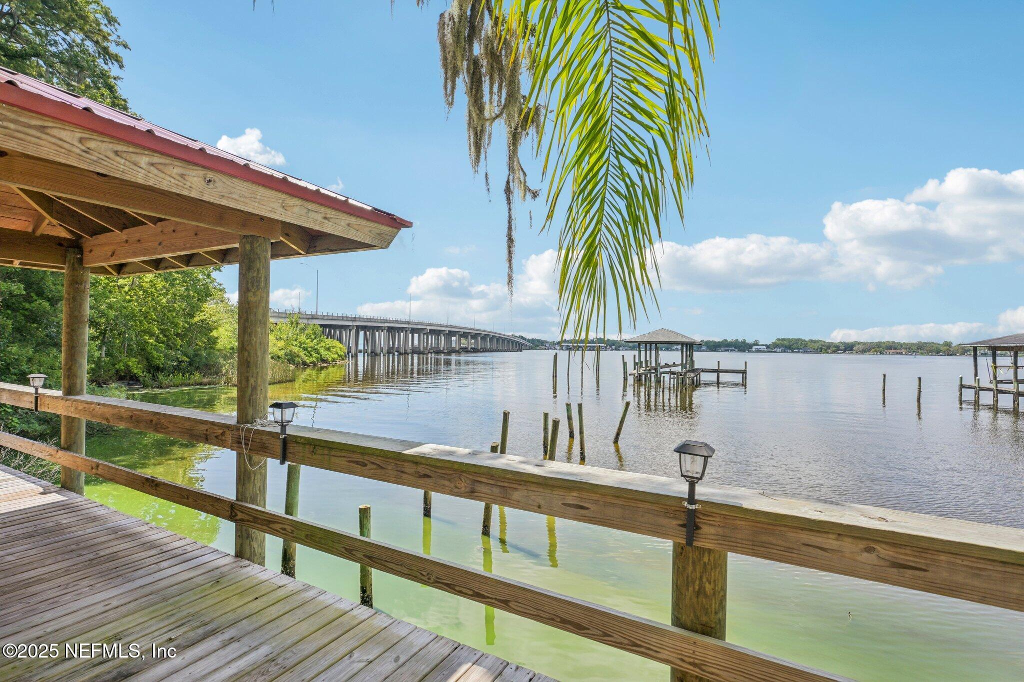 2778 Holly Point Road West Orange Park, FL 32073 - Photo 5 of 68 a view of outdoor space with swimming pool and deck