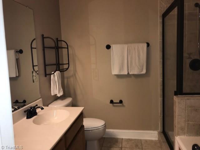 111 Powers Road Winston-Salem, NC 27106 - Photo 14 of 22 Double Vanity, plenty of cabinetry, Big tub, tile shower - all spic and span clean!