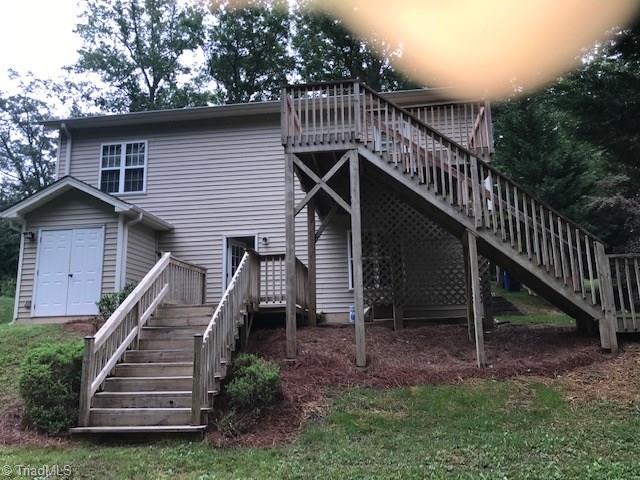111 Powers Road Winston-Salem, NC 27106 - Photo 21 of 22 Plenty of play area, two storage rooms on exterior - exterior entrance to basement into laundry room