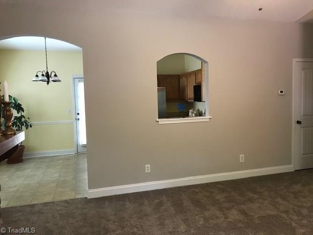 111 Powers Road Winston-Salem, NC 27106 - Photo 8 of 22 From Living Room to breakfast room to Kitchen - invite folks over and find how easy it is to entertain
