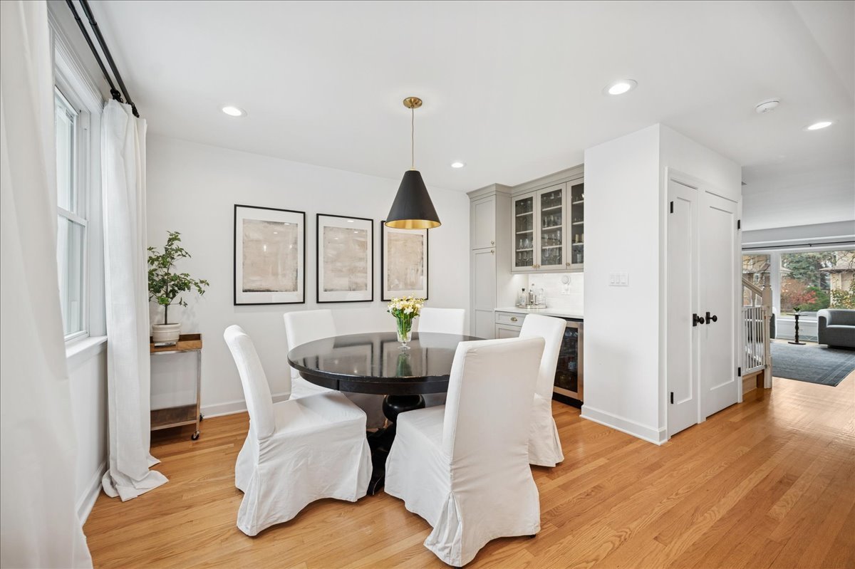 821 Lathrop Avenue Forest Park, IL 60130 - Photo 12 of 38 a view of a dining room with furniture window and wooden floor