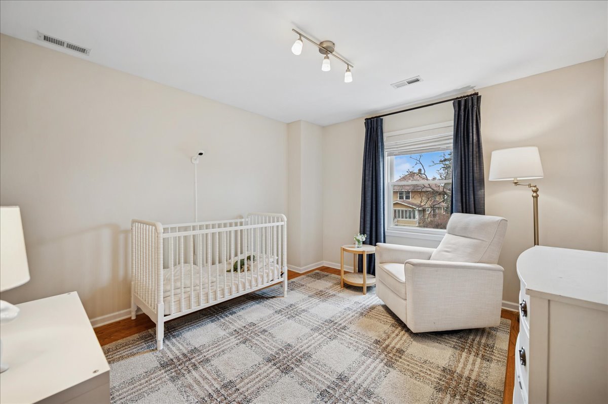 821 Lathrop Avenue Forest Park, IL 60130 - Photo 23 of 38 a living room with furniture and a window