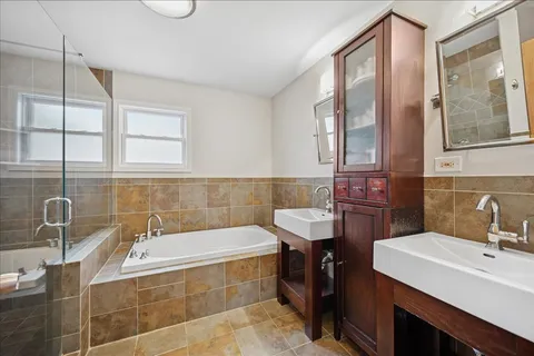 a bathroom with a sink and a bathtub