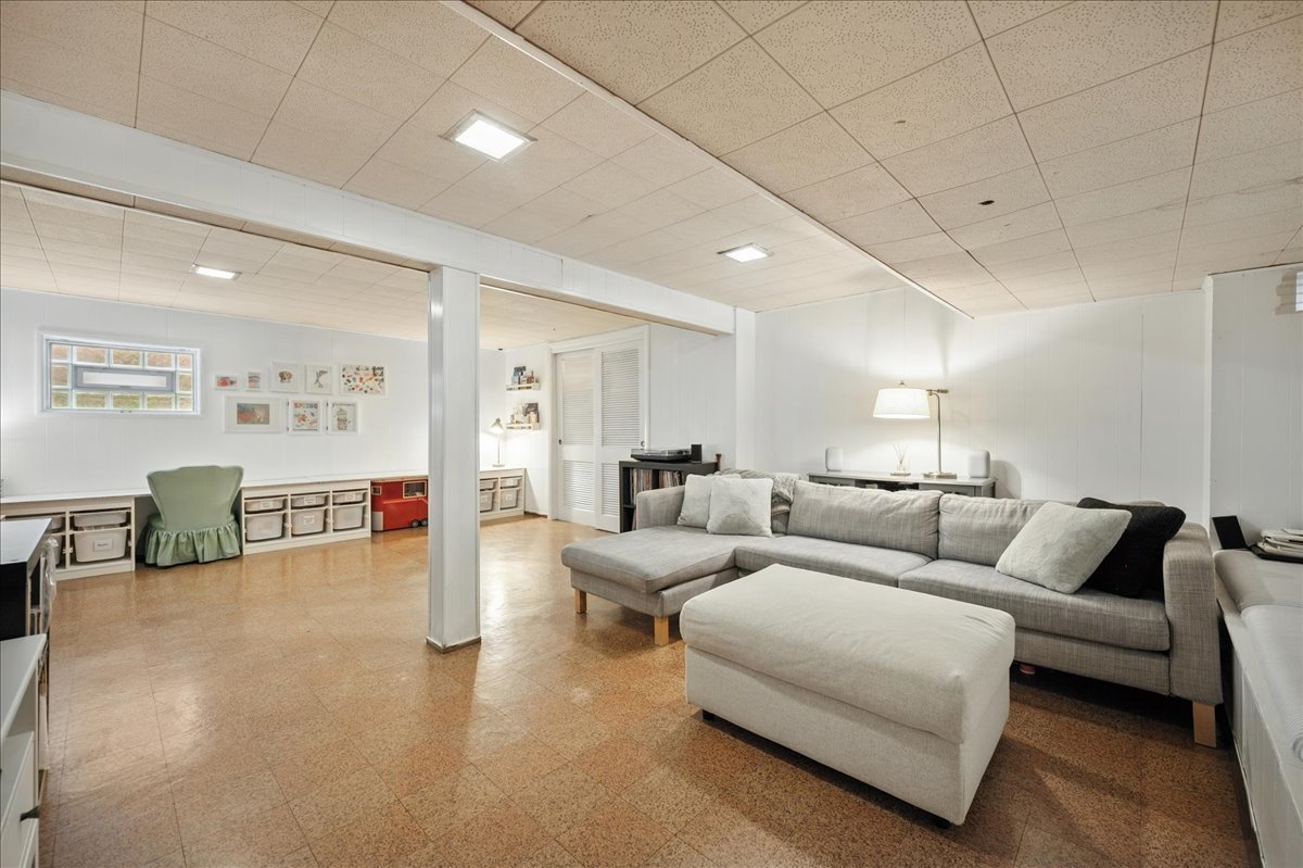 821 Lathrop Avenue Forest Park, IL 60130 - Photo 25 of 38 a living room with furniture and a table