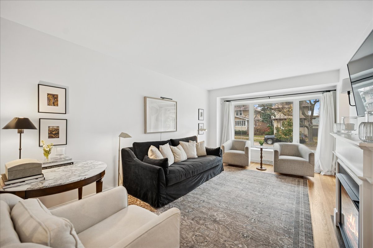821 Lathrop Avenue Forest Park, IL 60130 - Photo 3 of 38 a living room with furniture and a window