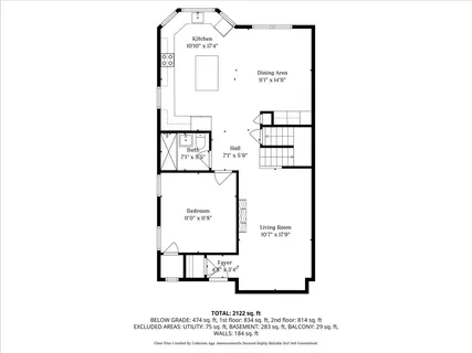 a picture of a bench in front of a wall