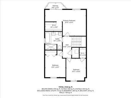 a picture of a bench in front of a wall