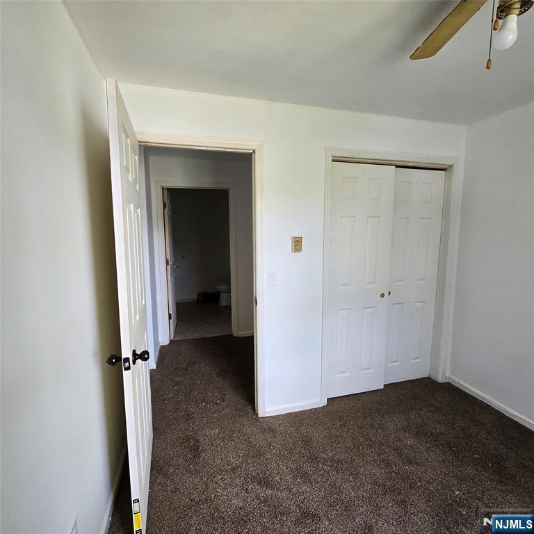 107 Chatfield Drive Pompton Plains, NJ 07444 - Photo 4 of 4 wooden floor and closet in an empty room