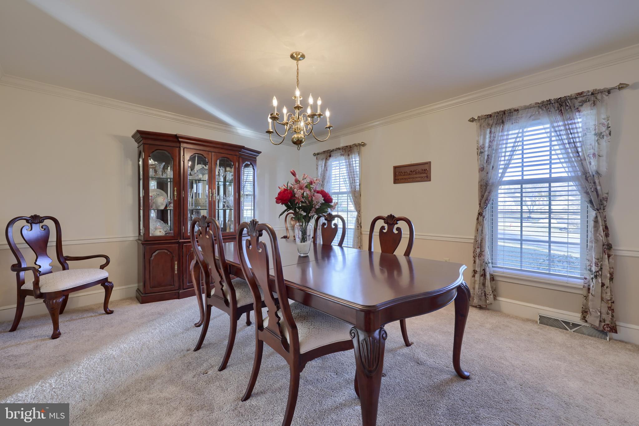 128 Hammersmith Lane Lititz, PA 17543 - Photo 16 of 65 a view of a dining room with furniture and chandelier