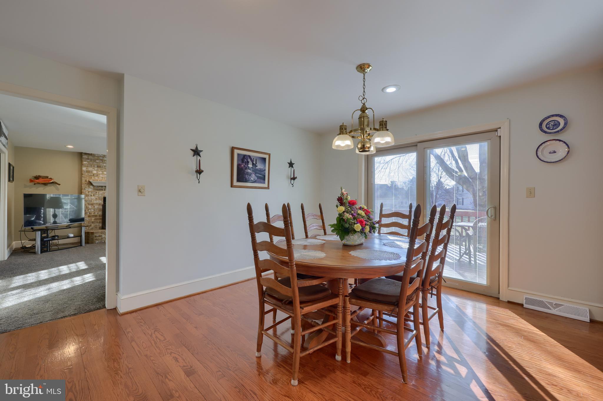 128 Hammersmith Lane Lititz, PA 17543 - Photo 24 of 65 a view of a dining room with furniture window and wooden floor