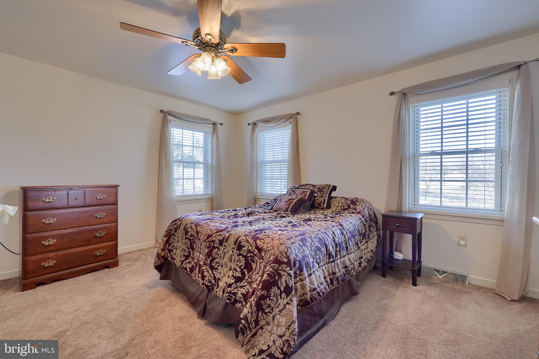 128 Hammersmith Lane Lititz, PA 17543 - Photo 39 of 65 a bedroom with a bed and a dresser