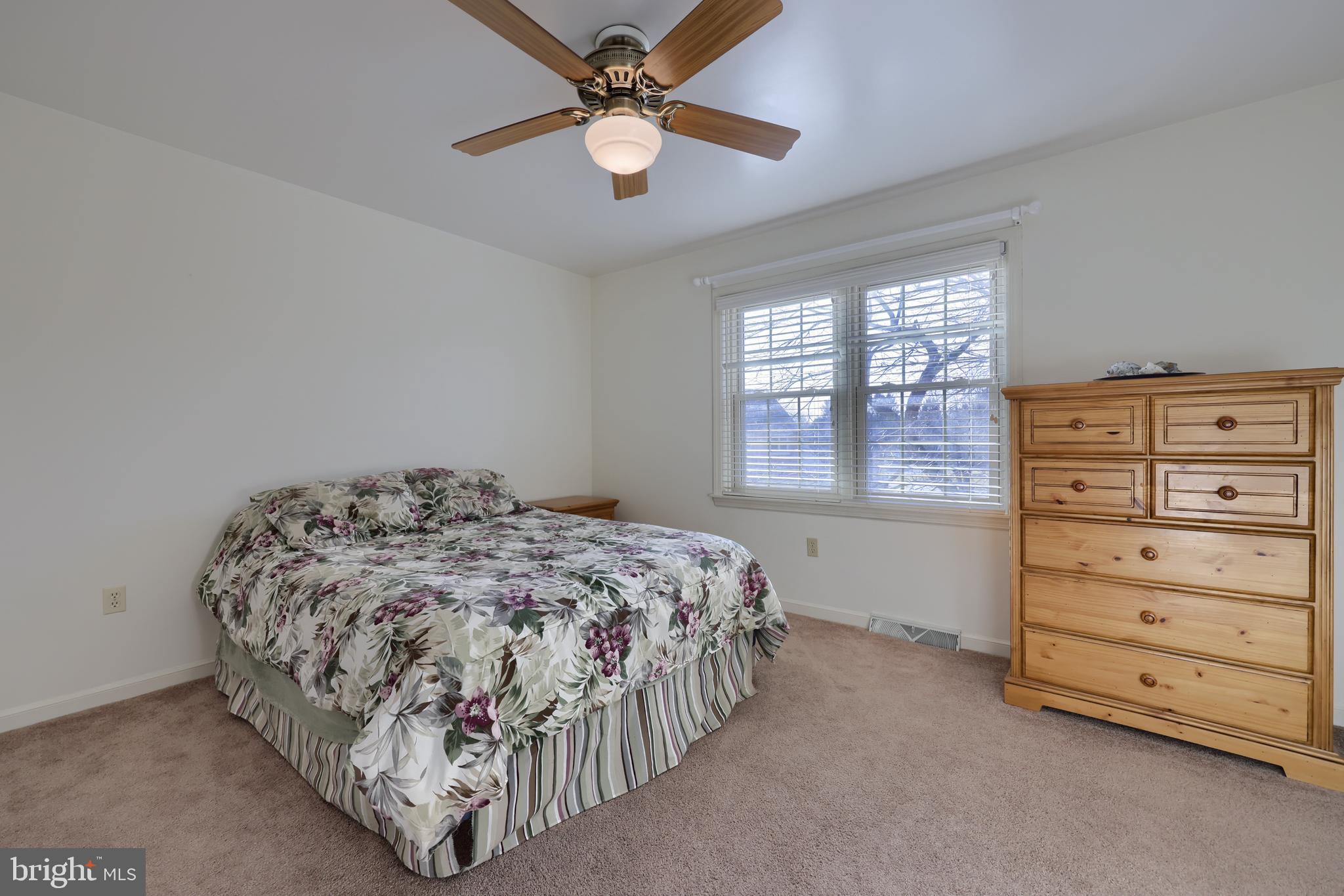 128 Hammersmith Lane Lititz, PA 17543 - Photo 40 of 65 a bedroom with a bed and a window