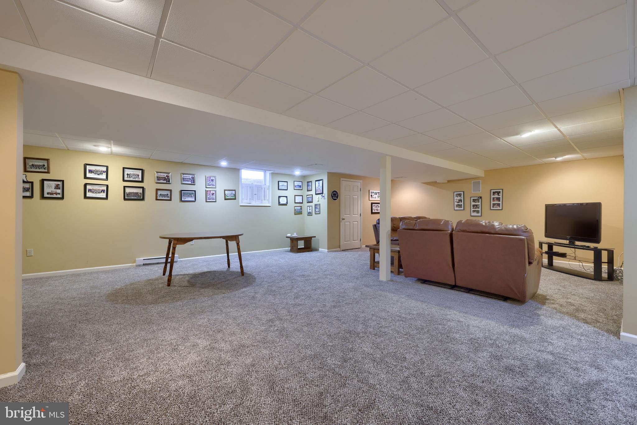 128 Hammersmith Lane Lititz, PA 17543 - Photo 44 of 65 a view of a livingroom with furniture and a flat screen tv