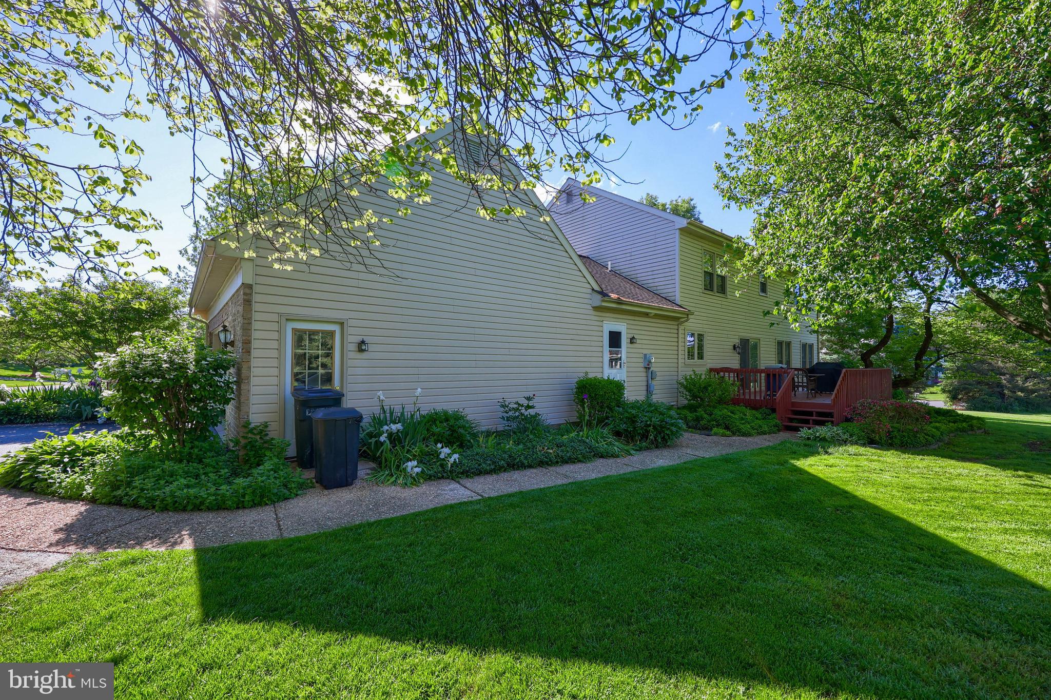 128 Hammersmith Lane Lititz, PA 17543 - Photo 61 of 65 a front view of a house with a garden and yard