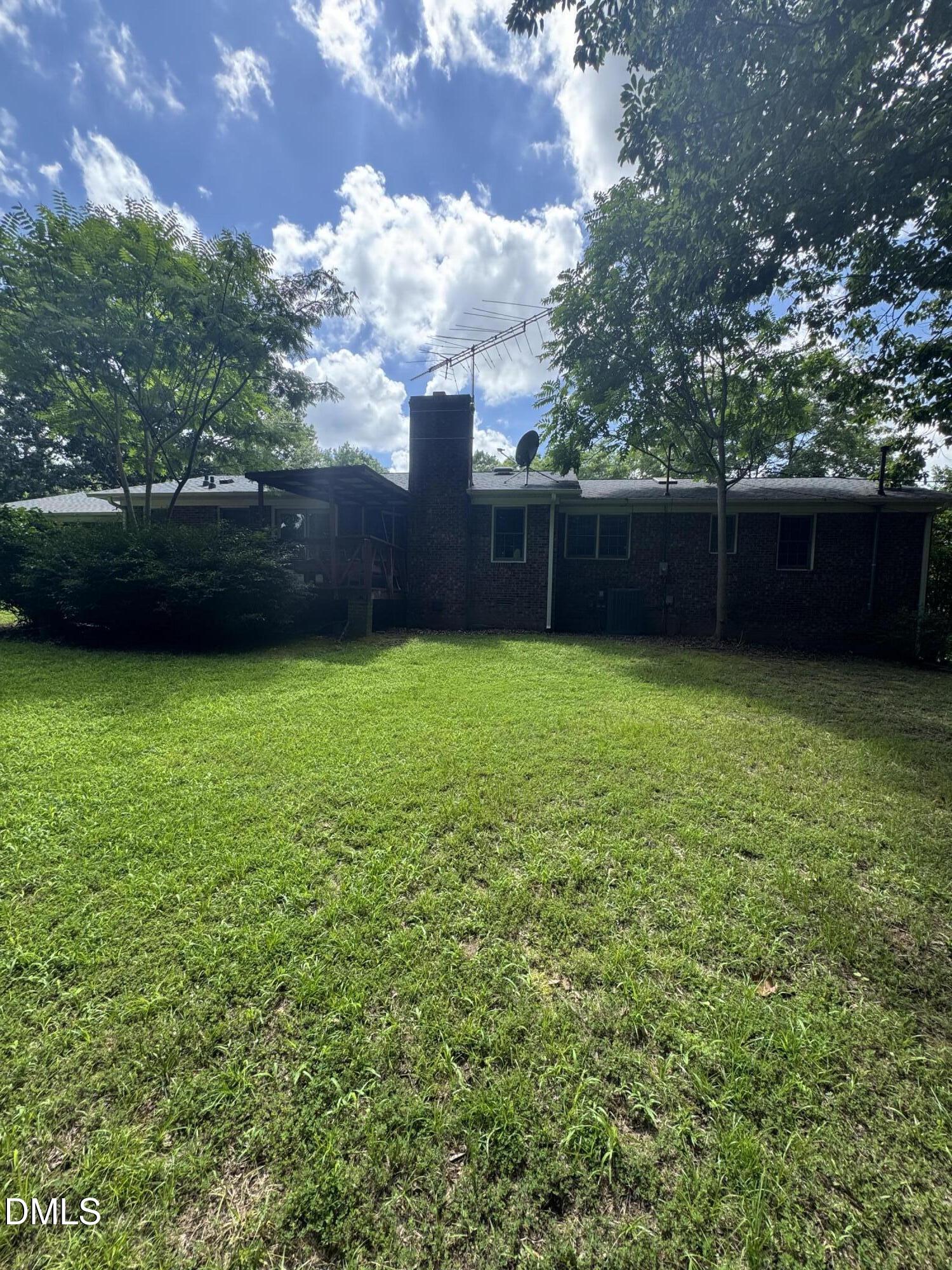 552 Clay Thomas Road Roxboro, NC 27573 - Photo 2 of 18 a view of a backyard