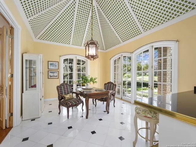 a room with furniture and a large window