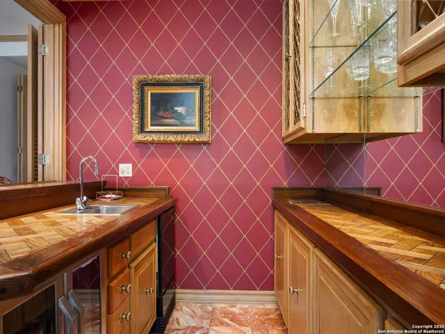 a spacious bathroom with a sink double vanity and a mirror