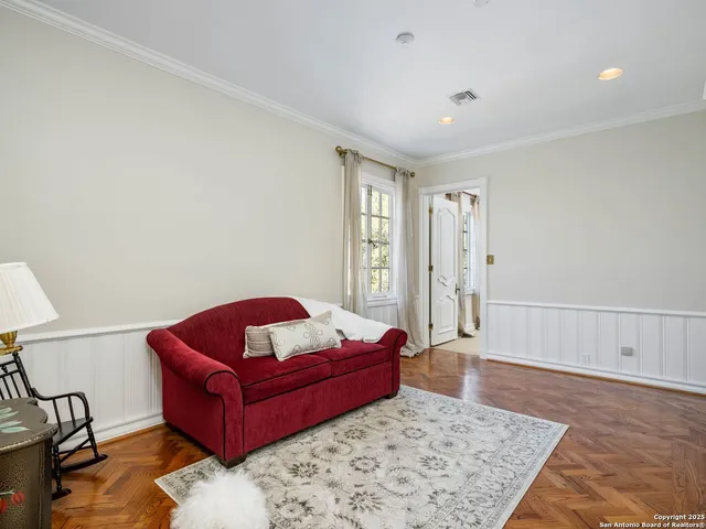 a view of a chair and tables in the backyard