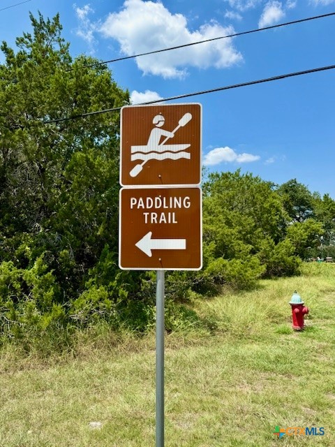 28 Cheyenne Trail Belton, TX 76513 - Photo 10 of 11 a sign that is sitting on a brick wall