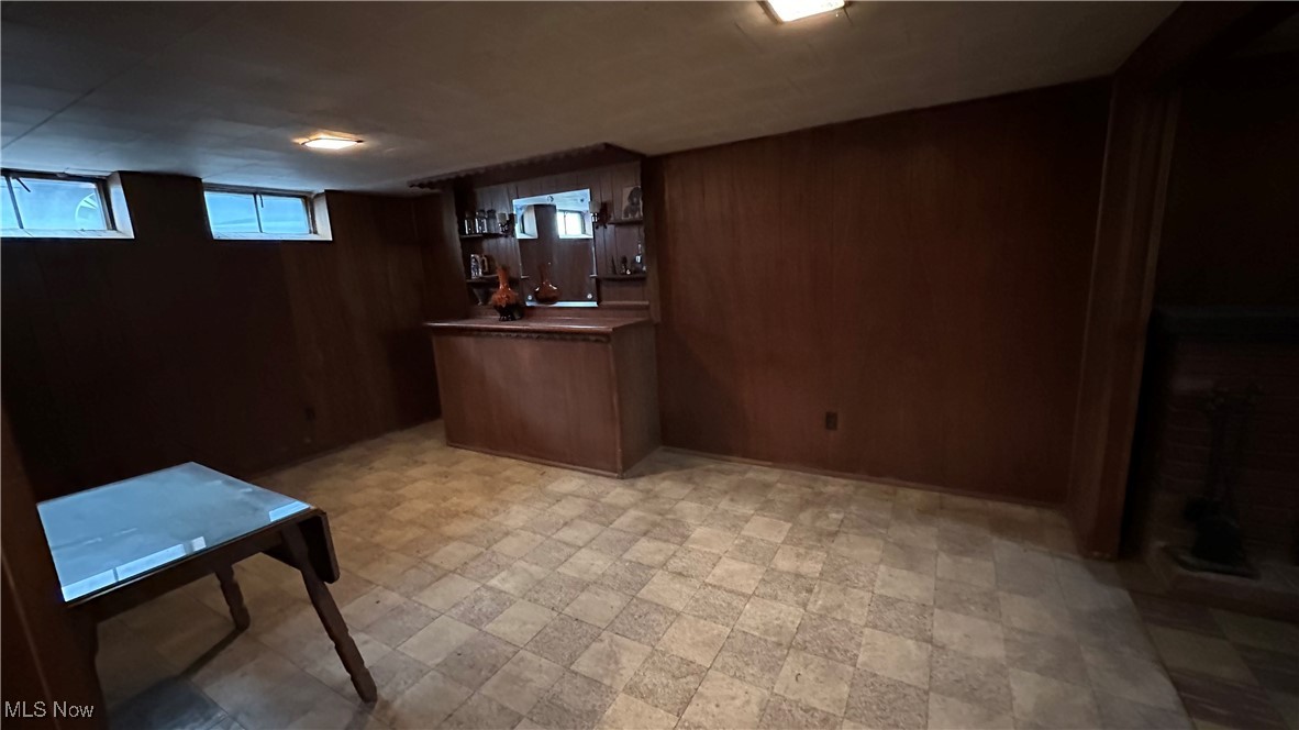15917 Turney Road Maple Heights, OH 44137 - Photo 13 of 19 Finished lower level recreation room with built-in bar and electric fireplace