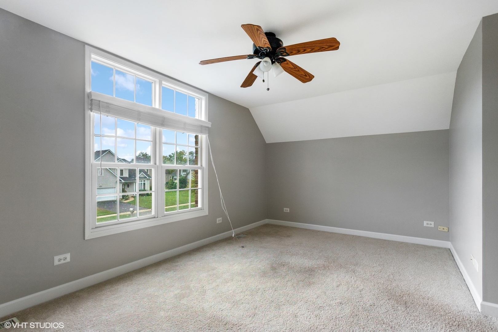 2908 Beth Lane Naperville, IL 60564 - Photo 12 of 21 a view of a livingroom with a ceiling fan and window