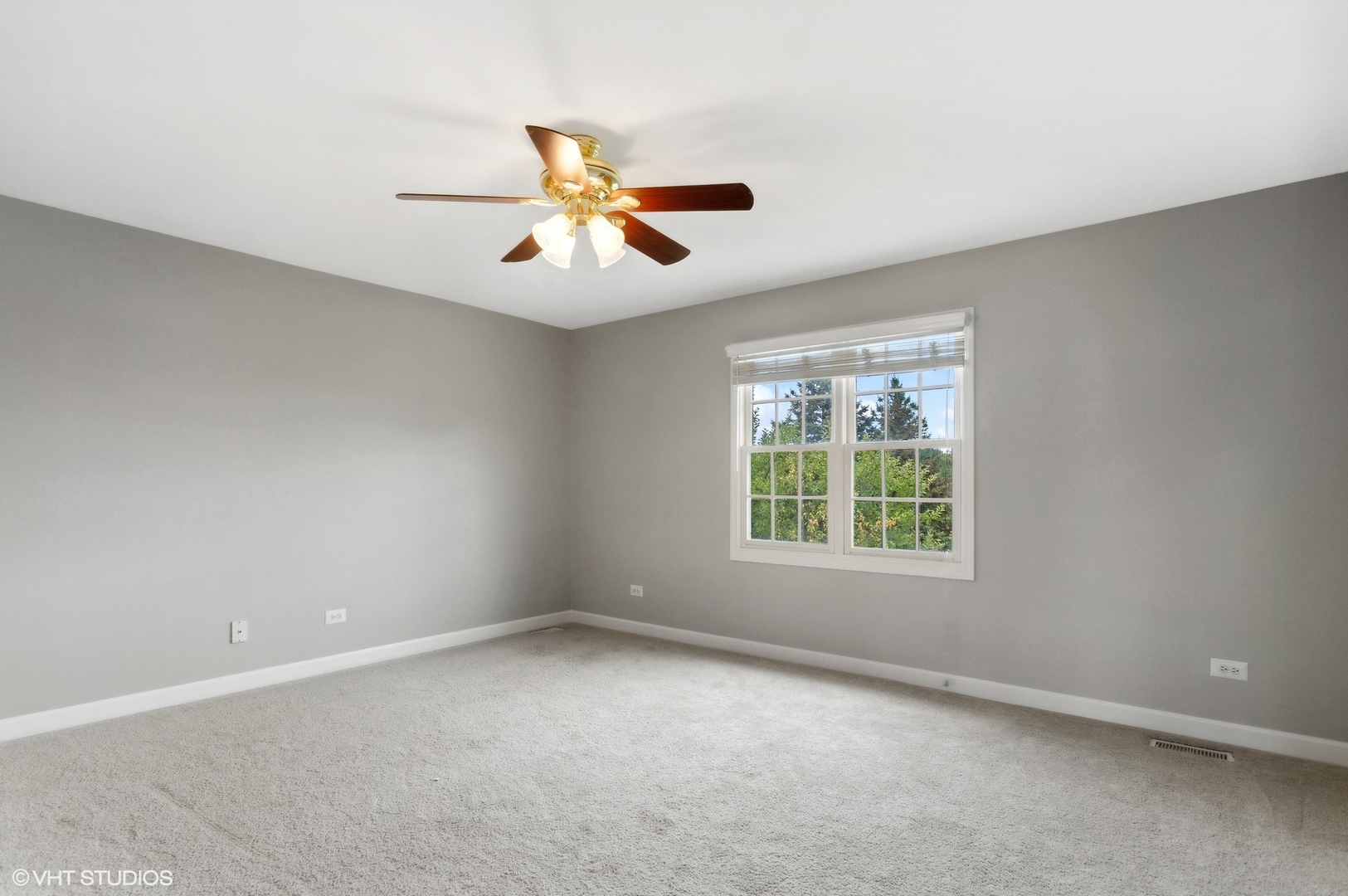 2908 Beth Lane Naperville, IL 60564 - Photo 15 of 21 an empty room with windows and fan