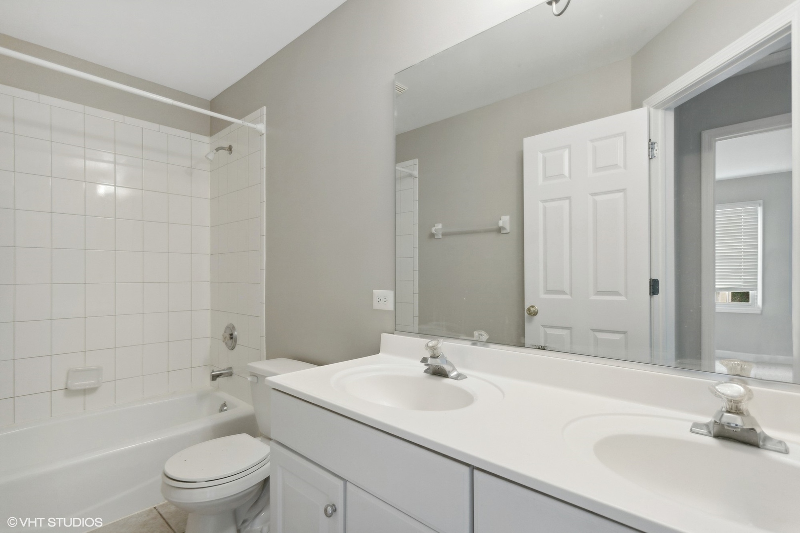 2908 Beth Lane Naperville, IL 60564 - Photo 18 of 21 a bathroom with a sink a toilet and shower