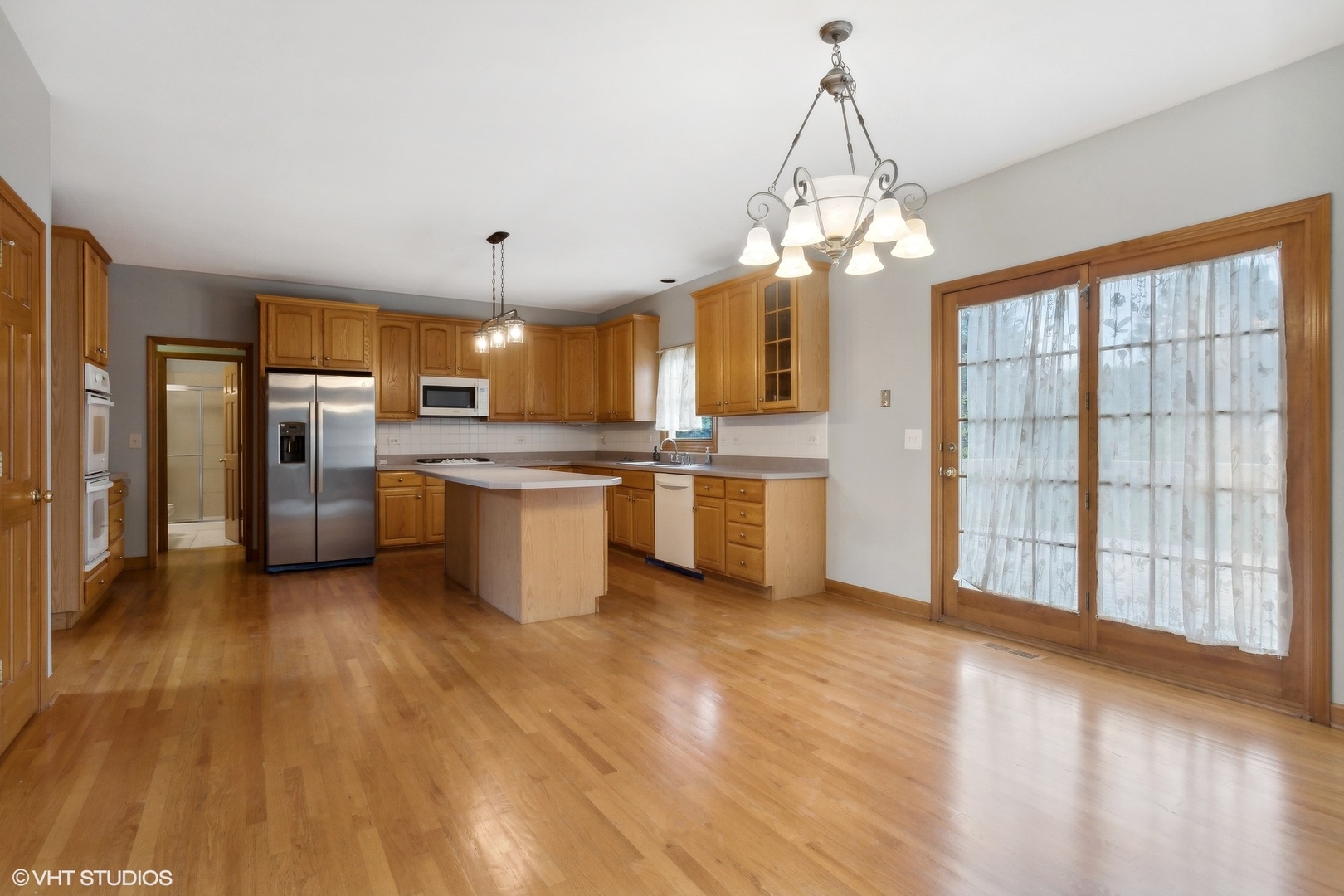 2908 Beth Lane Naperville, IL 60564 - Photo 6 of 21 a view of a kitchen with stove and refrigerator