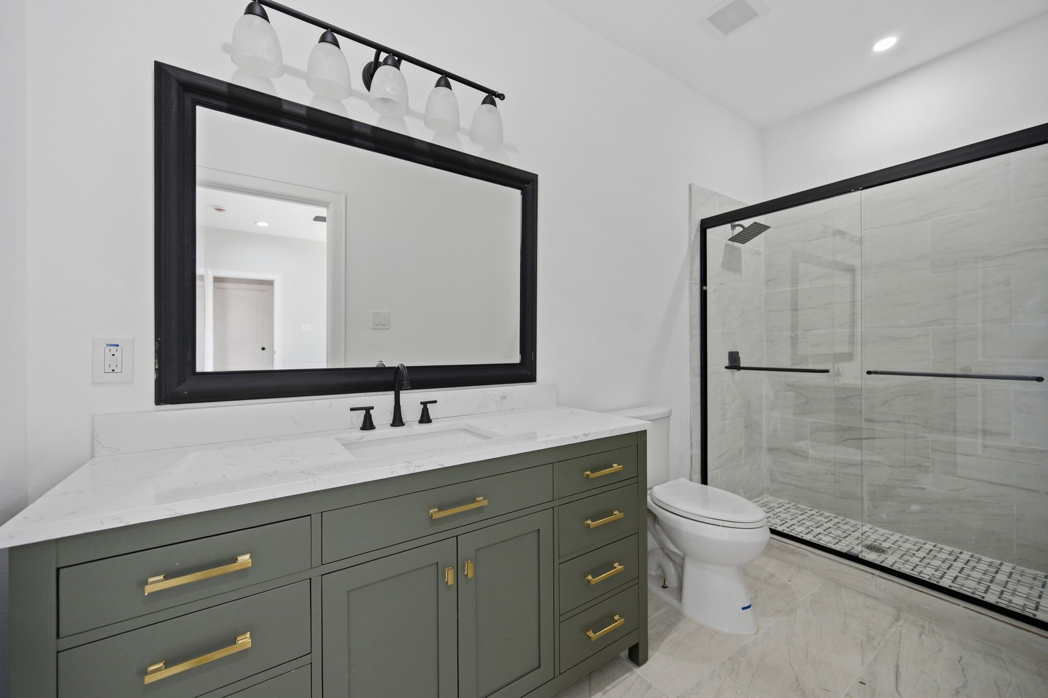 160 Oak Lane Shepherd, TX 77371 - Photo 14 of 22 a bathroom with a toilet a sink and mirror