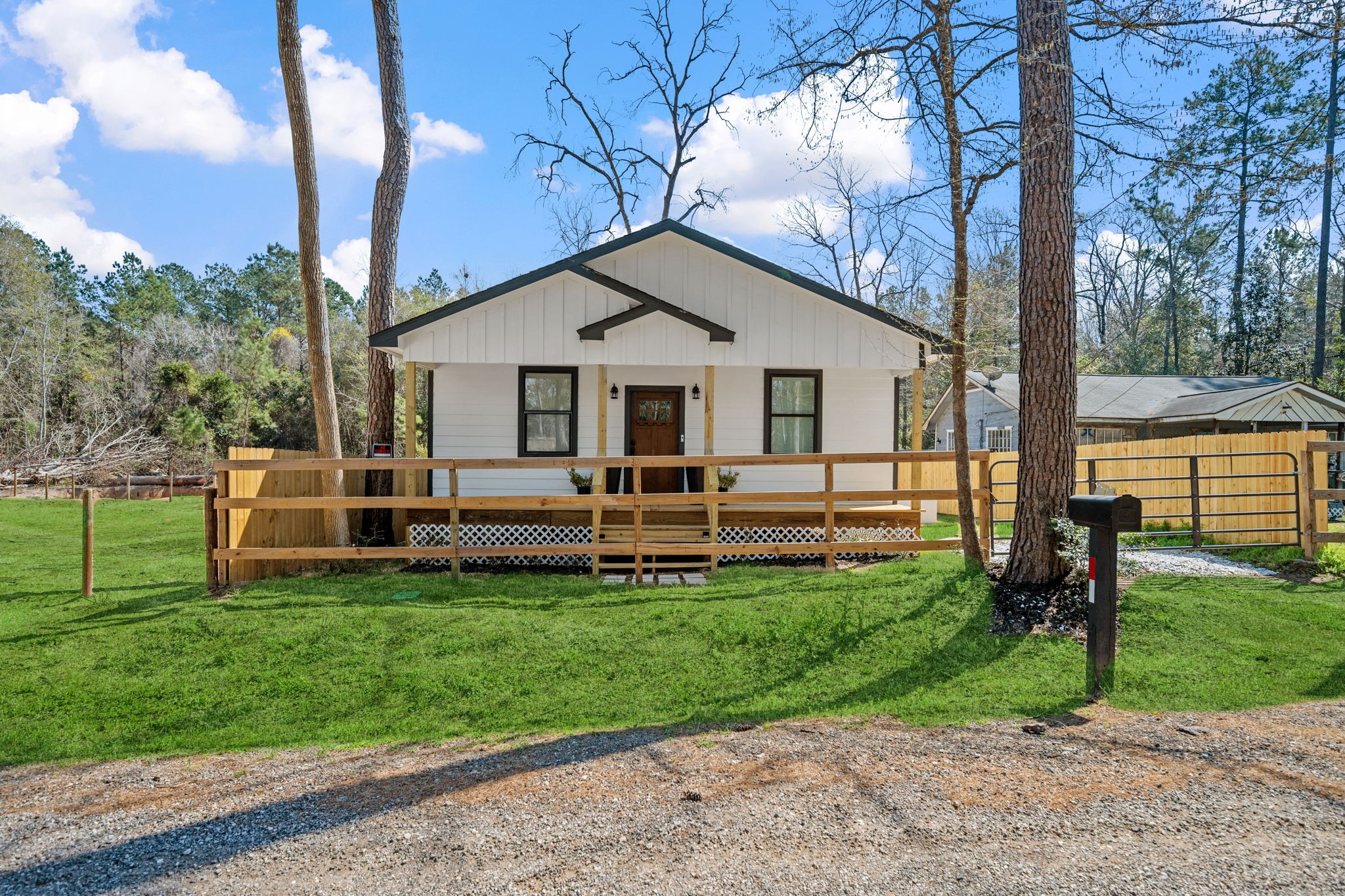 160 Oak Lane Shepherd, TX 77371 - Photo 2 of 22 a view of a house with a backyard