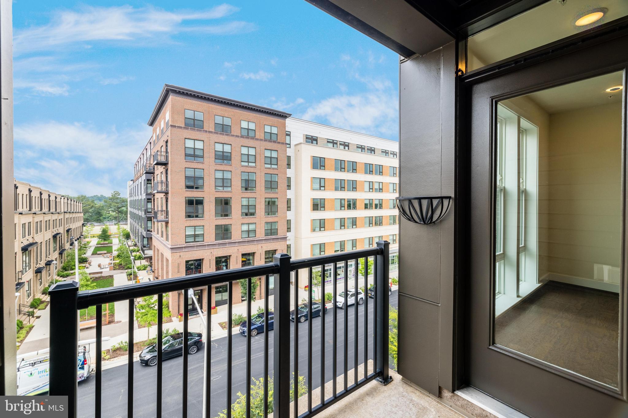 11200 Reston Station Boulevard, Unit 502 Reston, VA 20190 - Photo 18 of 40 Southern facing covered balcony