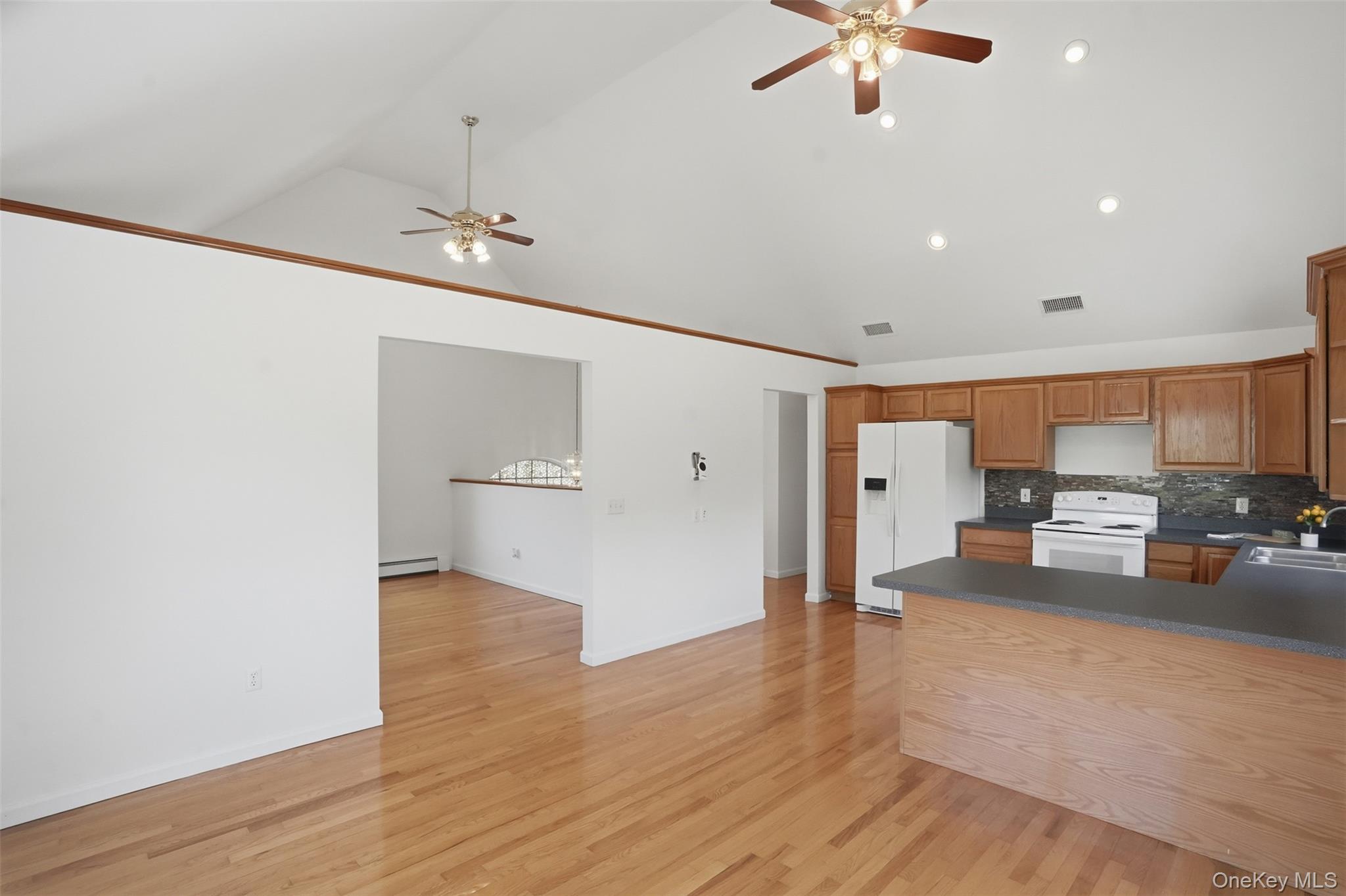 160 Pirog Road Pine Bush, NY 12566 - Photo 13 of 50 a view of a kitchen with a sink and a refrigerator