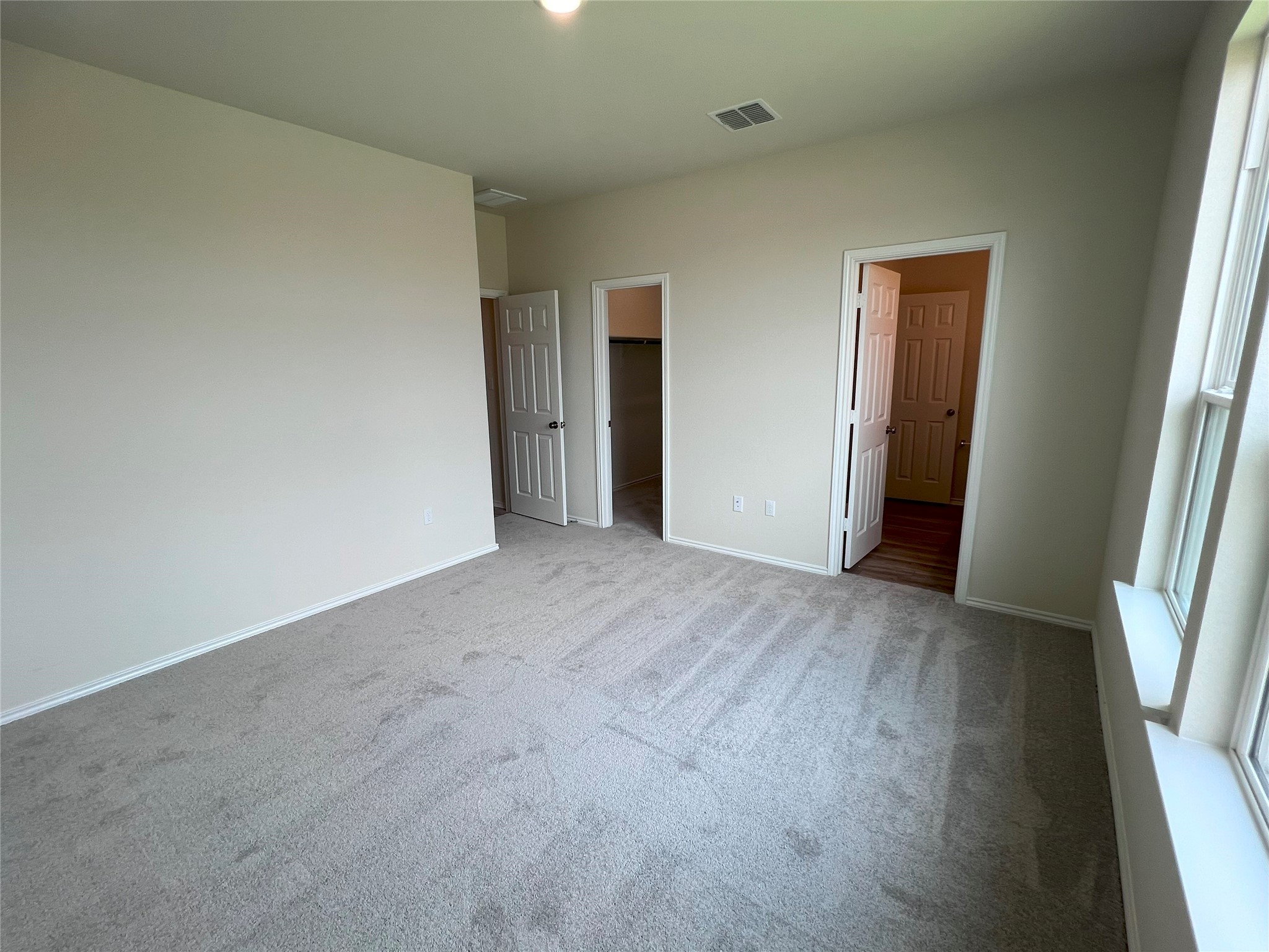 427 Tree Nut Loop Buda, TX 78610 - Photo 15 of 38 a view of an empty room and a gallery