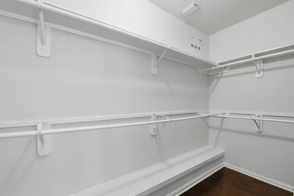 a view of a hallway with stairs