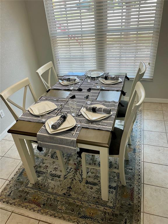 802 Marcia Loop Winter Haven, FL 33884 - Photo 15 of 48 a dining room with furniture