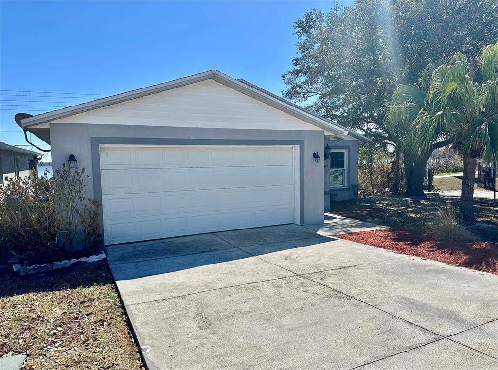 802 Marcia Loop Winter Haven, FL 33884 - Photo 24 of 48 a view of backyard of the house