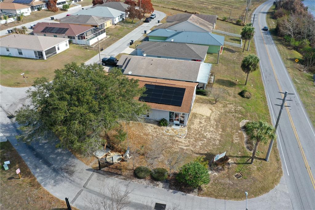 802 Marcia Loop Winter Haven, FL 33884 - Photo 36 of 48 an aerial view of a house with a yard and plants