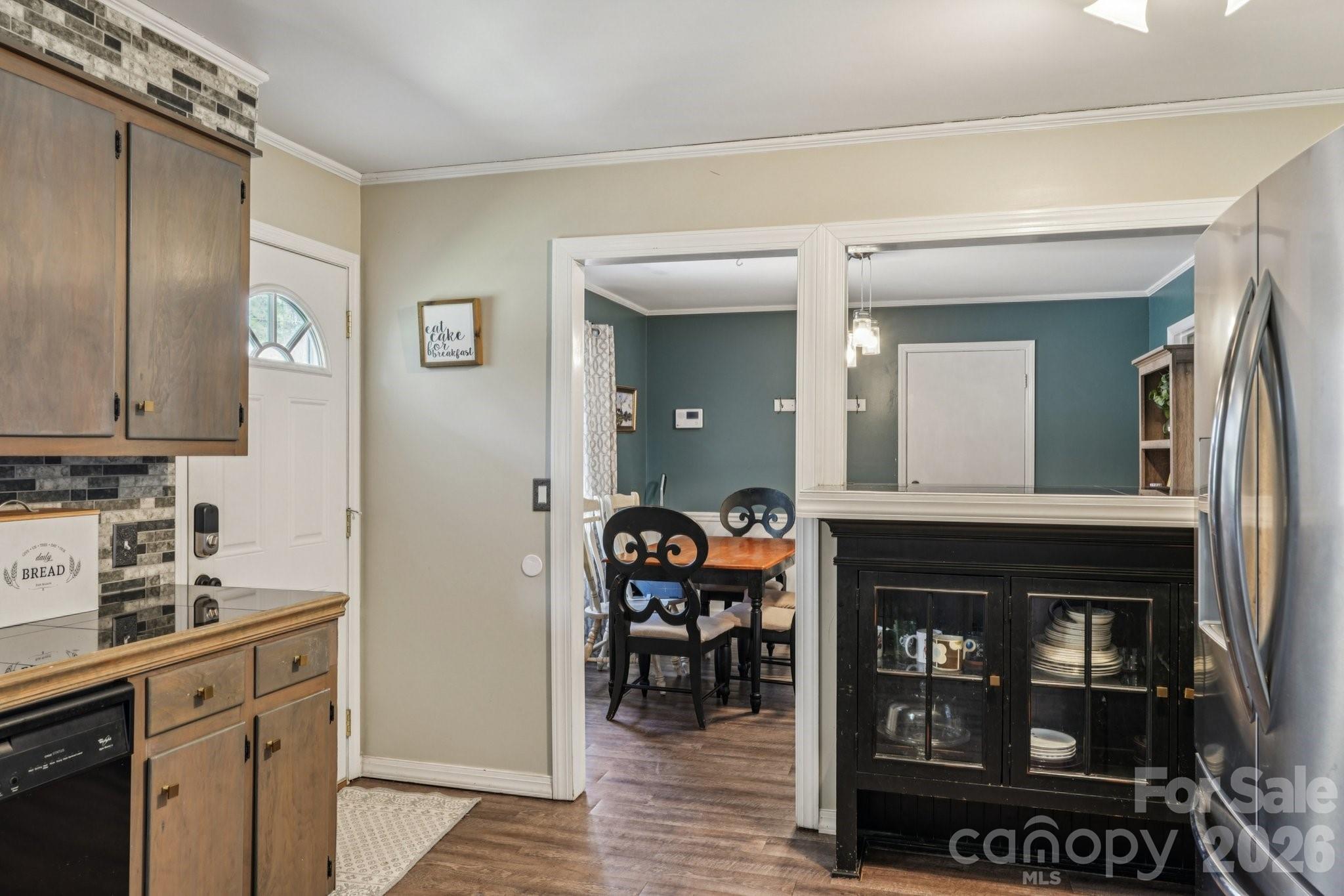 660 South Peace Haven Road Winston-Salem, NC 27103 - Photo 14 of 43 a living room with furniture and a fireplace