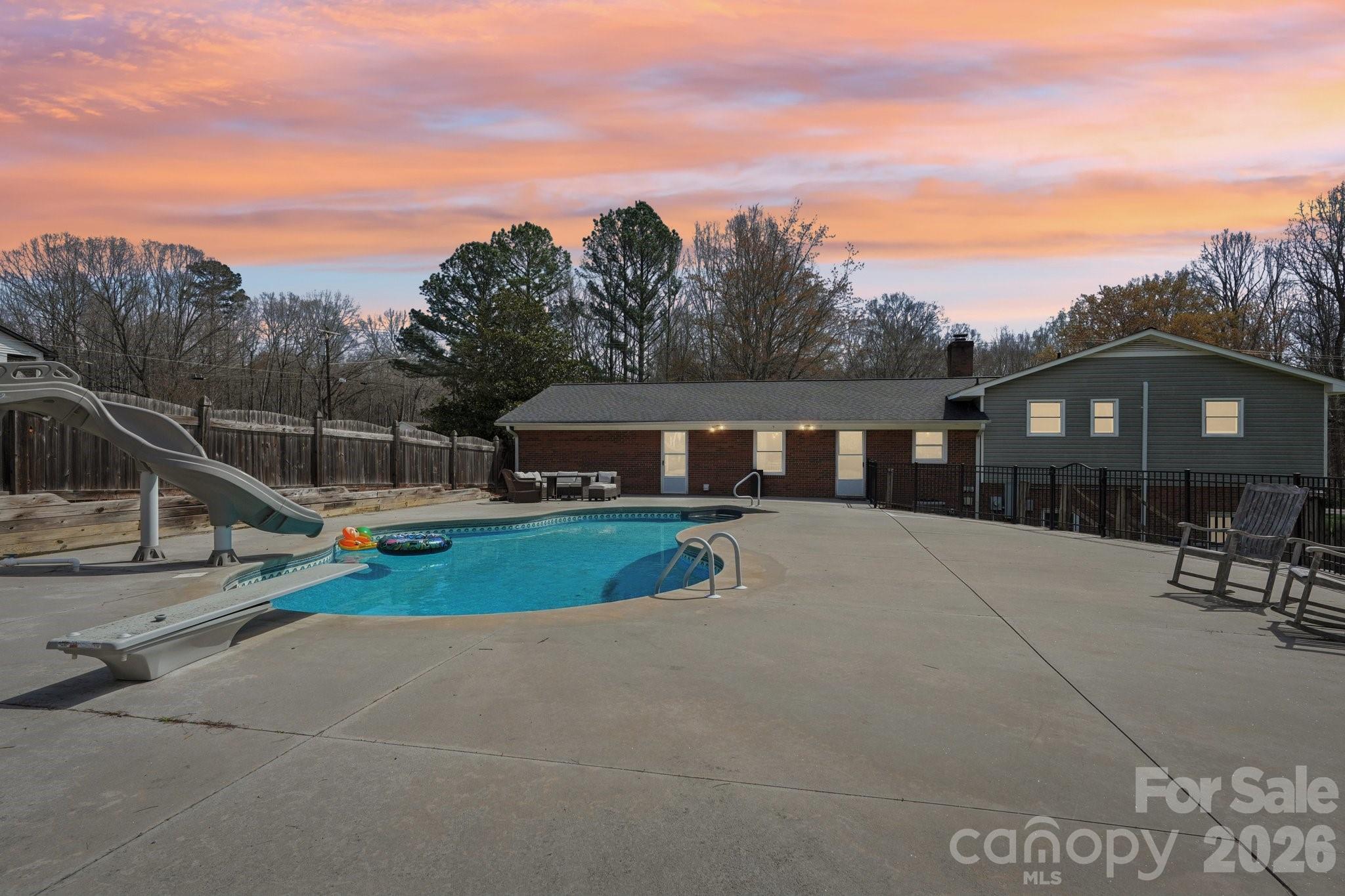 660 South Peace Haven Road Winston-Salem, NC 27103 - Photo 3 of 43 a view of house with outdoor space and sitting area