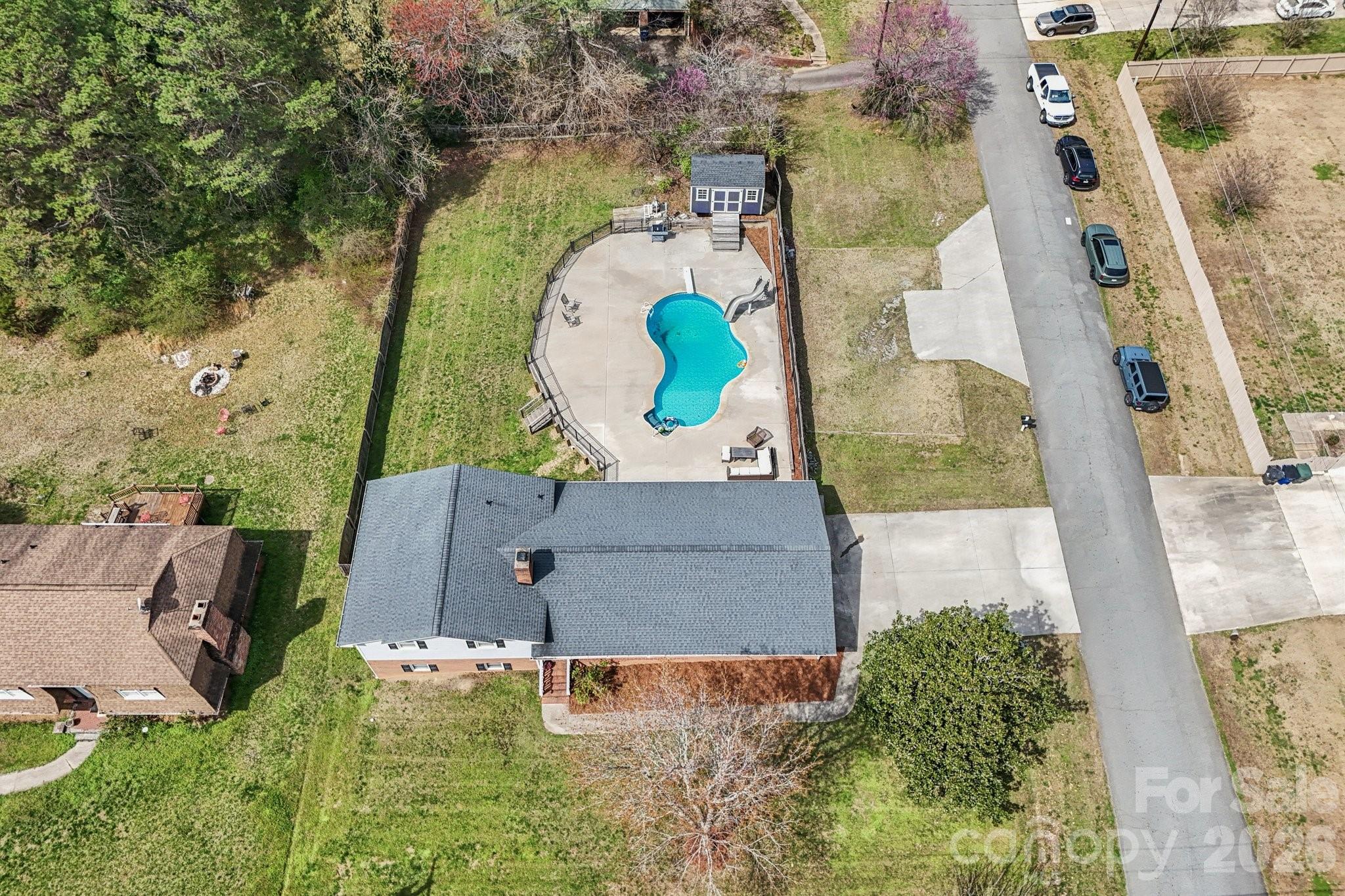 660 South Peace Haven Road Winston-Salem, NC 27103 - Photo 35 of 43 an aerial view of a house with a swimming pool