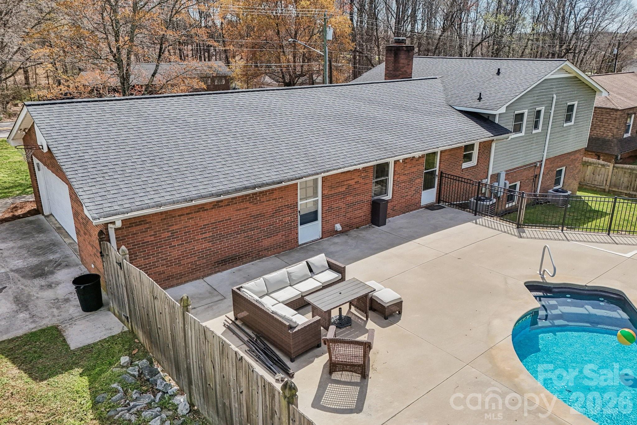 660 South Peace Haven Road Winston-Salem, NC 27103 - Photo 37 of 43 a terrace with outdoor seating and wooden floor