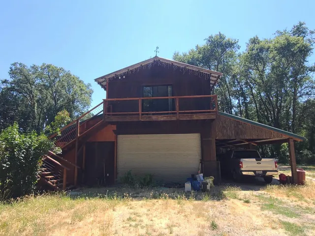a bathroom with a toilet and shower