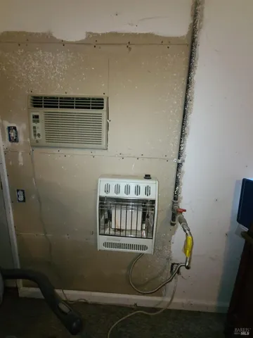 a view of a storage room with furniture