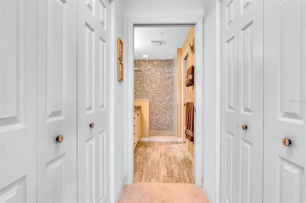 2090 Matecumbe Key Road, Unit 1105 Punta Gorda, FL 33955 - Photo 27 of 58 a view of a bathroom from a hallway