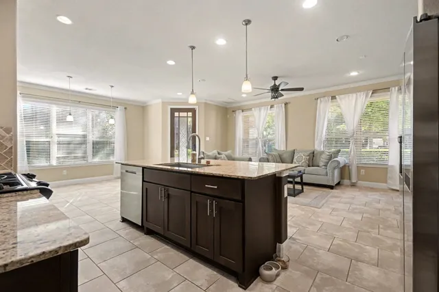 a large bathroom with a large tub and sink